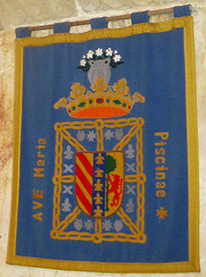 Repostero con el escudo de armas de la Divisa, en la Bas�lica de Santa Mar�a de la Piscina